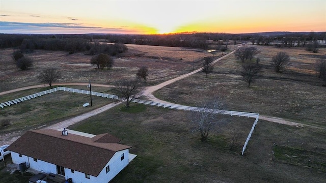 aerial view at dusk with a rural view