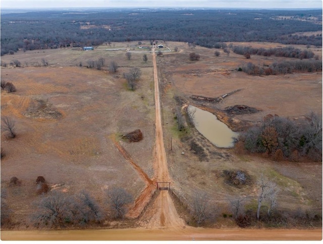 bird's eye view featuring a water view and a rural view