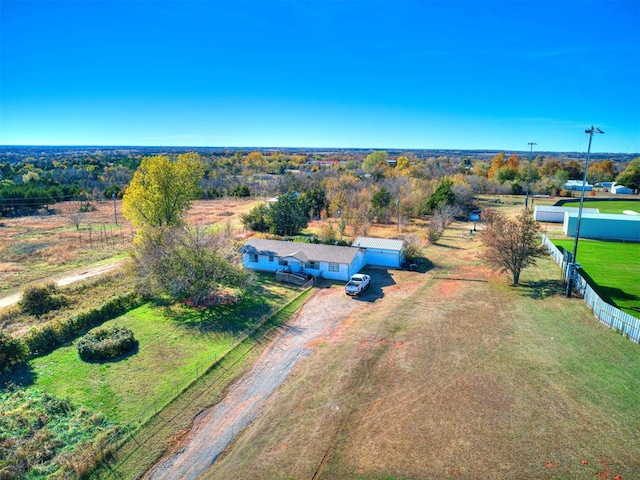 birds eye view of property with a rural view