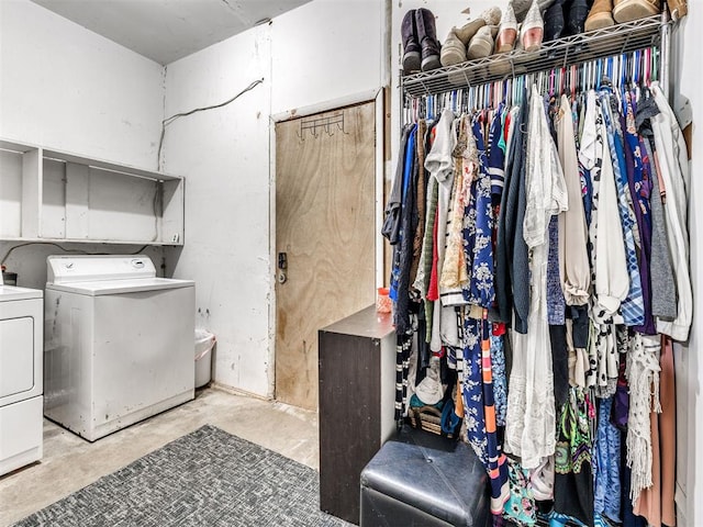 laundry area with washing machine and dryer