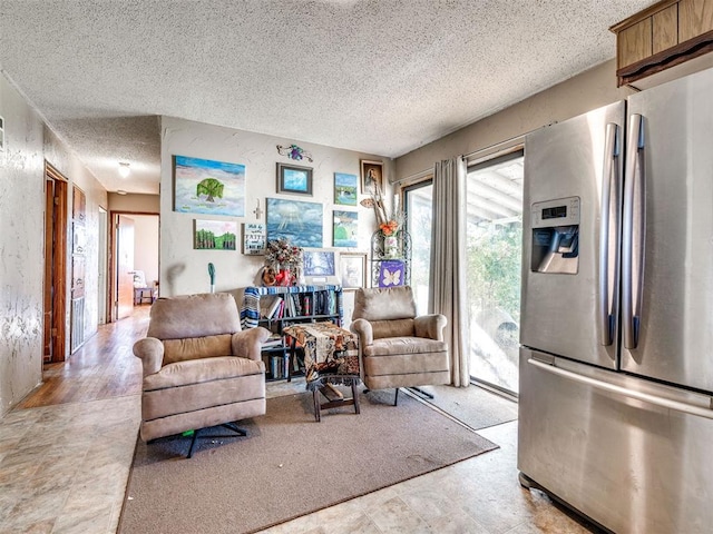 living room with a textured ceiling