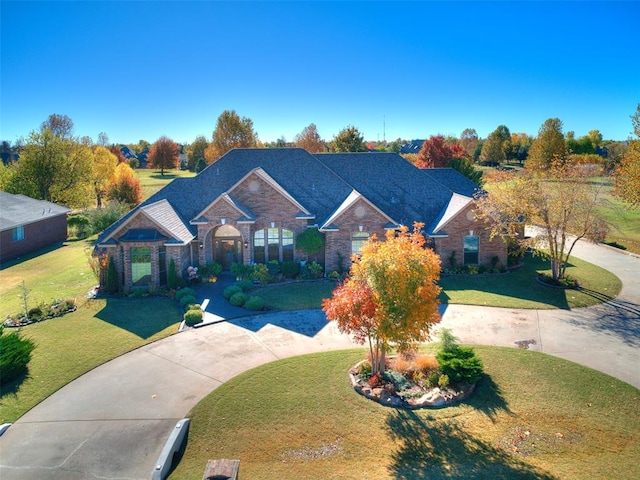 view of front of home with a front lawn