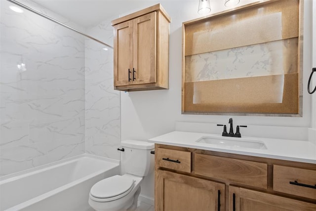 full bathroom with vanity, toilet, and tiled shower / bath combo