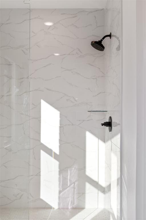 room details with a tile shower