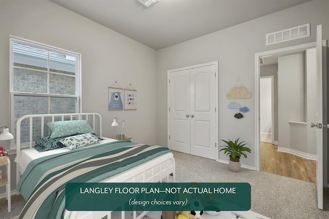 carpeted bedroom featuring a closet