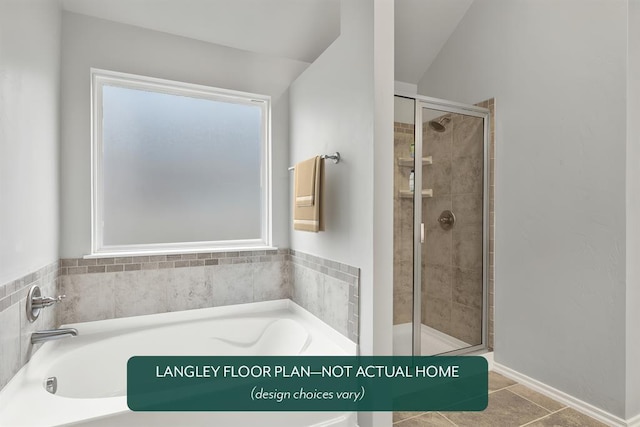 bathroom featuring tile patterned flooring and plus walk in shower