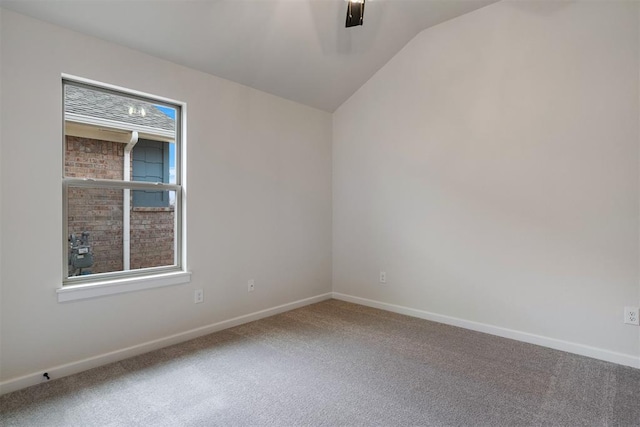 804 Argos Rd, Yukon, OK 73099 - carpeted spare room with vaulted ceiling and baseboards