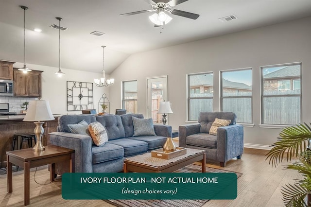 living room featuring ceiling fan with notable chandelier, light hardwood / wood-style flooring, and lofted ceiling