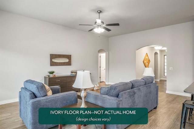 living room featuring hardwood / wood-style flooring and ceiling fan