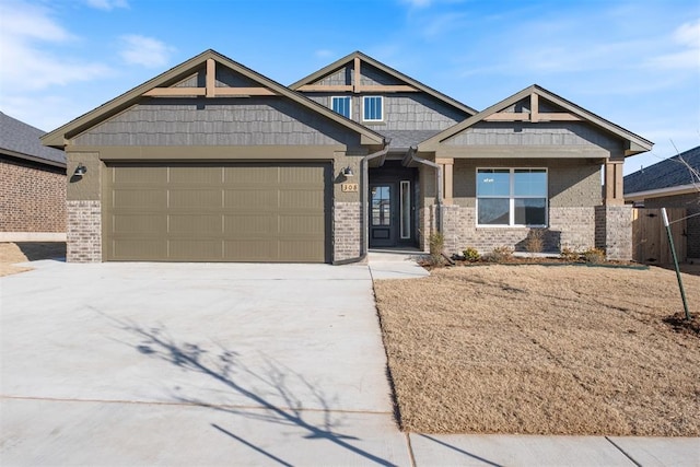 craftsman-style house featuring a garage