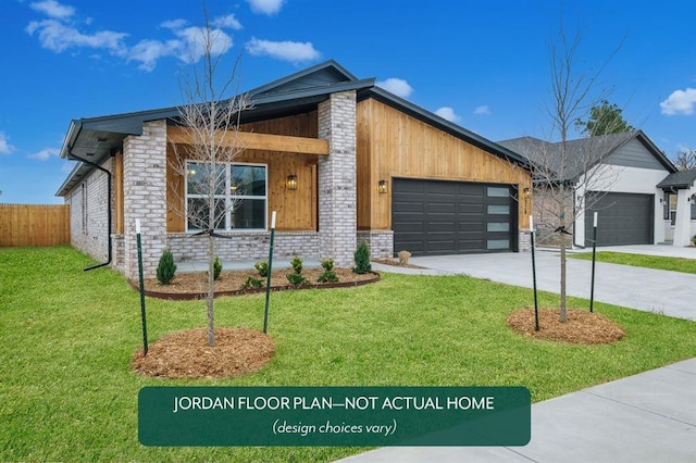 contemporary house with a front lawn and a garage