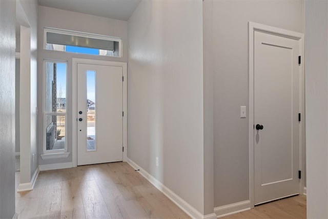 foyer entrance featuring light wood-type flooring