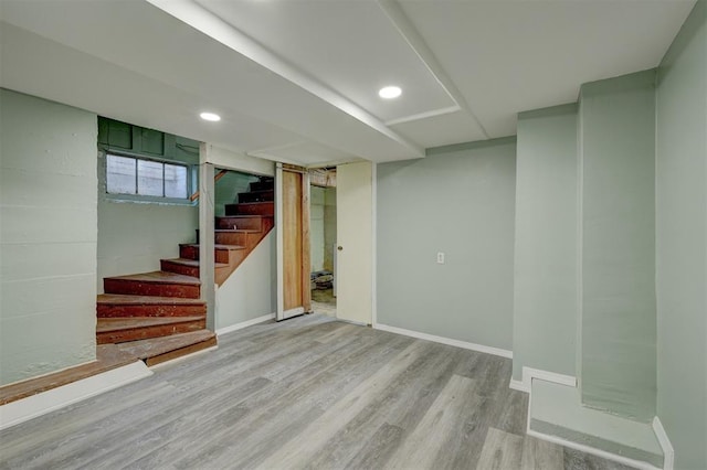 basement featuring light hardwood / wood-style floors