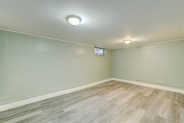 basement featuring light wood-type flooring