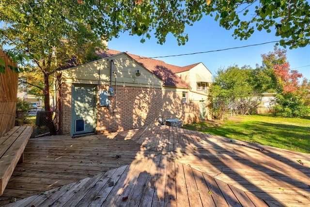 wooden deck with a yard