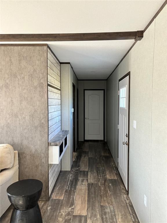 corridor featuring dark hardwood / wood-style floors