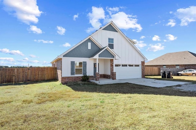 view of front facade with a garage and a front yard