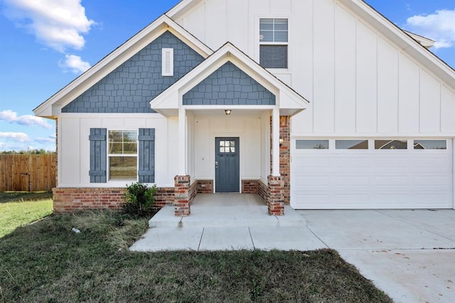 view of front of home with a garage