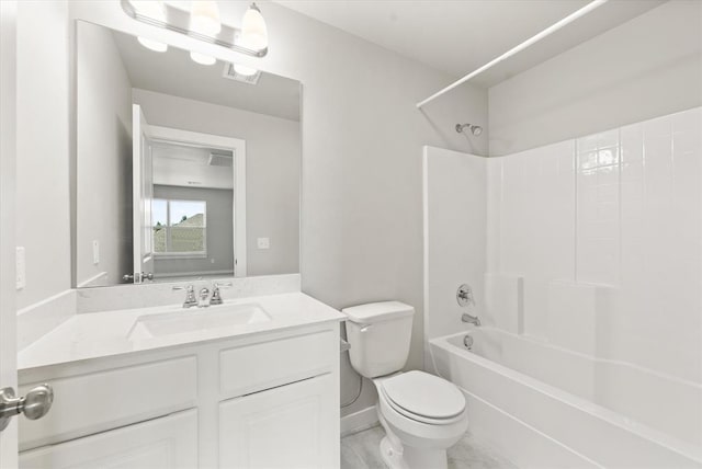 full bathroom with toilet, vanity, and tub / shower combination