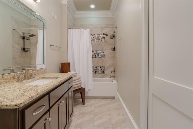 bathroom featuring shower / bath combo with shower curtain, vanity, and ornamental molding