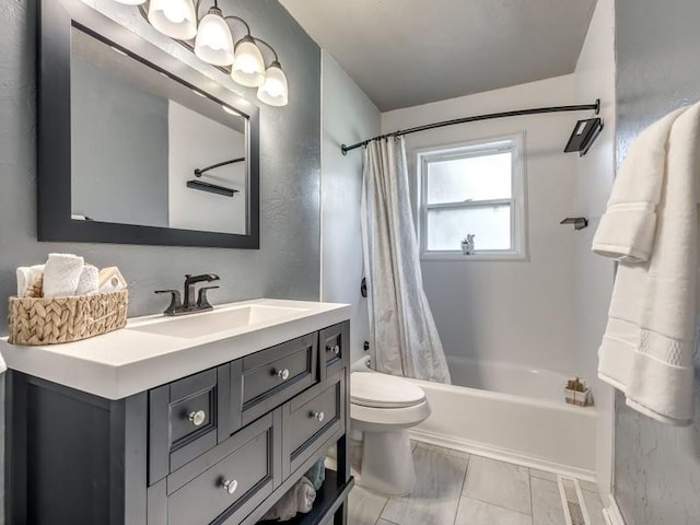 full bathroom featuring vanity, toilet, and shower / bath combo with shower curtain