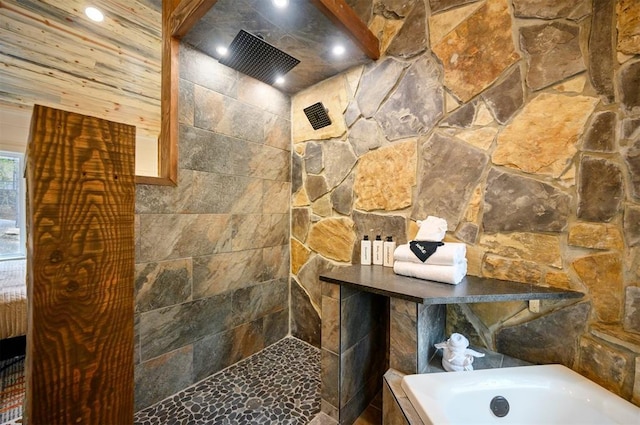 bathroom featuring plus walk in shower