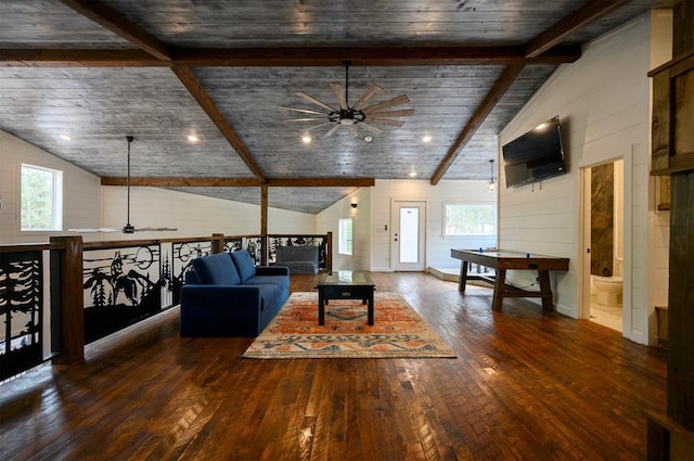 living room featuring vaulted ceiling with beams, dark hardwood / wood-style floors, ceiling fan, and wood ceiling