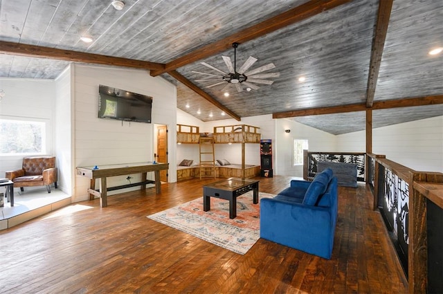 living room with vaulted ceiling with beams, dark hardwood / wood-style floors, wood ceiling, and ceiling fan