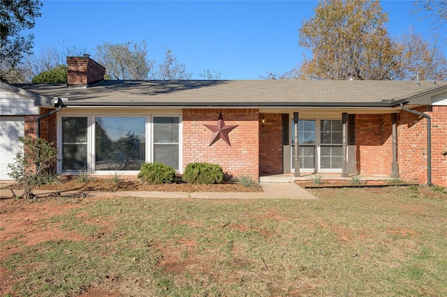 view of front of house with a front yard