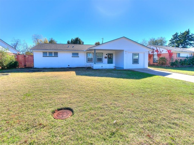 ranch-style home with a front lawn