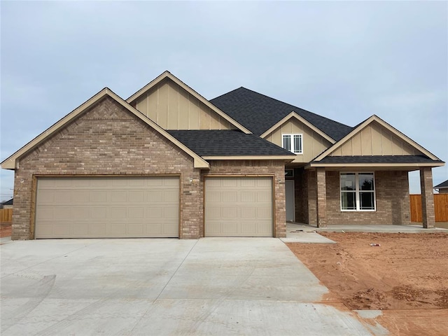 craftsman house with a garage