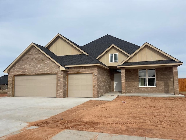 craftsman-style house featuring a porch and a garage