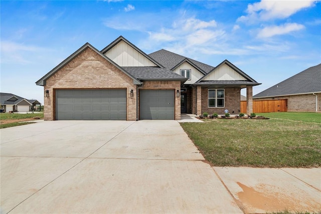 10513 SW 51st St, Mustang, OK 73064 - view of front of home featuring board and batten siding, a garage, brick siding, concrete driveway, and a shingled roof