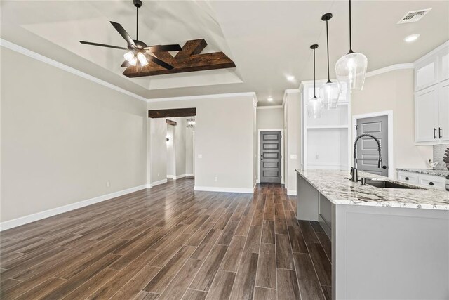 10513 SW 51st St, Mustang, OK 73064 - kitchen with a sink, a ceiling fan, dark wood finished floors, white cabinetry, and open floor plan