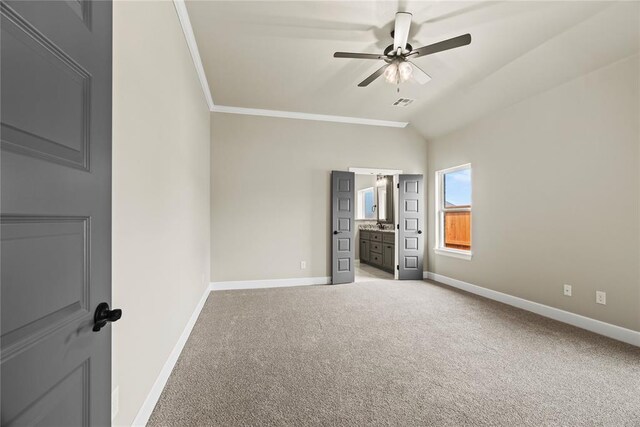 10513 SW 51st St, Mustang, OK 73064 - unfurnished bedroom featuring baseboards, light carpet, crown molding, ensuite bath, and a ceiling fan
