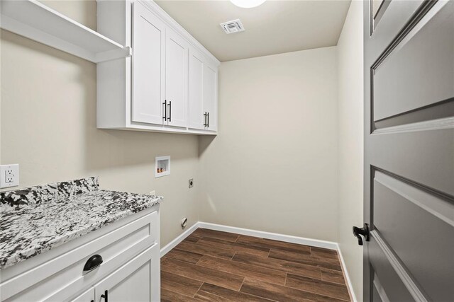10513 SW 51st St, Mustang, OK 73064 - laundry room featuring hookup for an electric dryer, cabinet space, dark wood finished floors, baseboards, and washer hookup