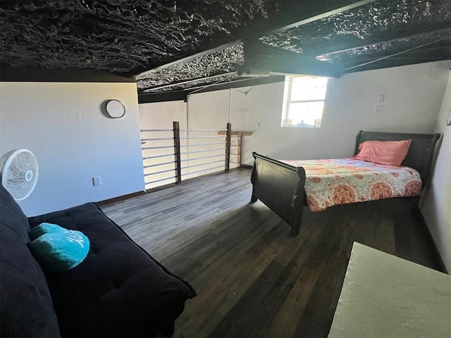 bedroom featuring wood-type flooring