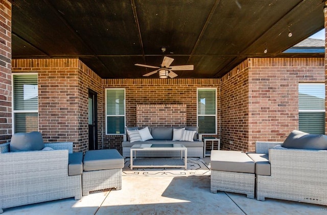 view of patio / terrace with ceiling fan and an outdoor hangout area