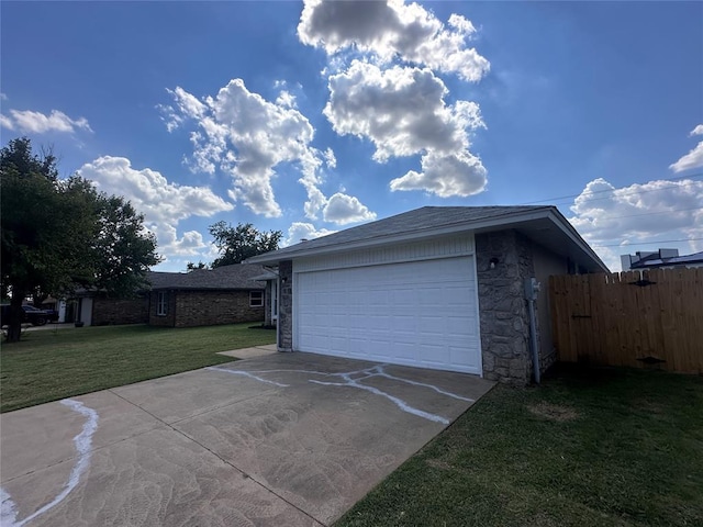 garage with a lawn