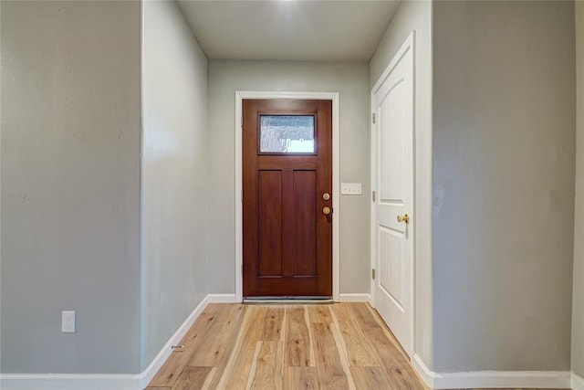 doorway to outside with light hardwood / wood-style floors