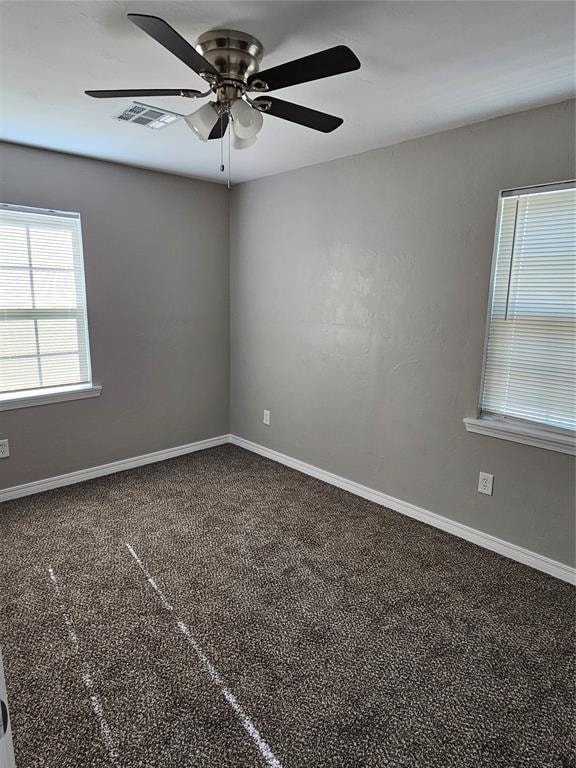 unfurnished room featuring carpet floors and ceiling fan