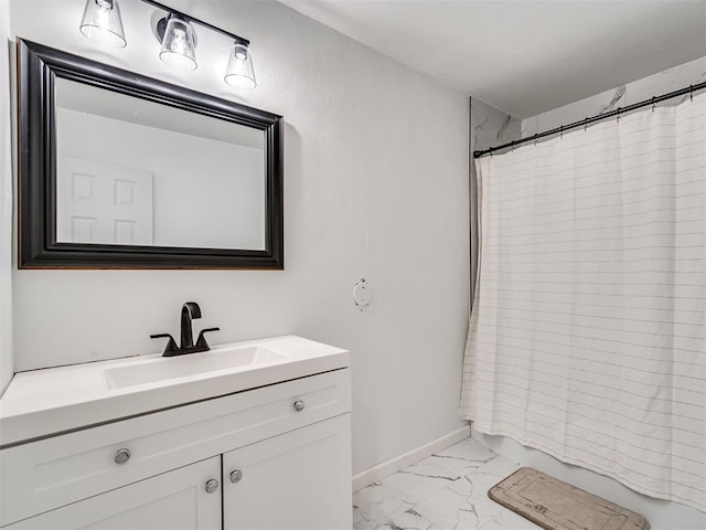 bathroom with vanity and walk in shower