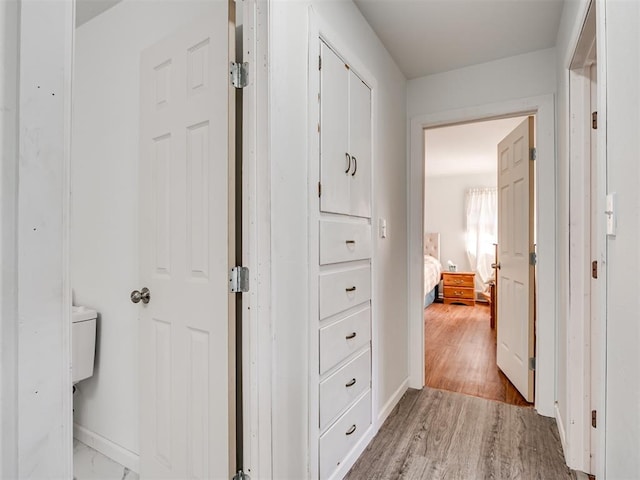 hall featuring light hardwood / wood-style flooring