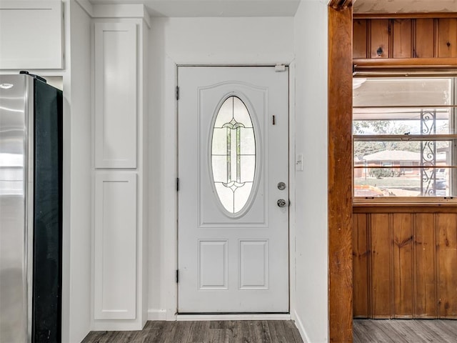 foyer entrance featuring wood-type flooring