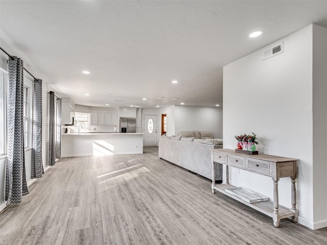 living room with light wood-type flooring