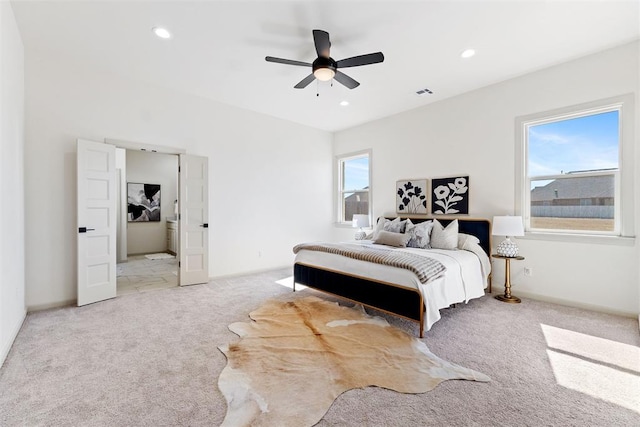 bedroom with recessed lighting, light colored carpet, ceiling fan, and visible vents