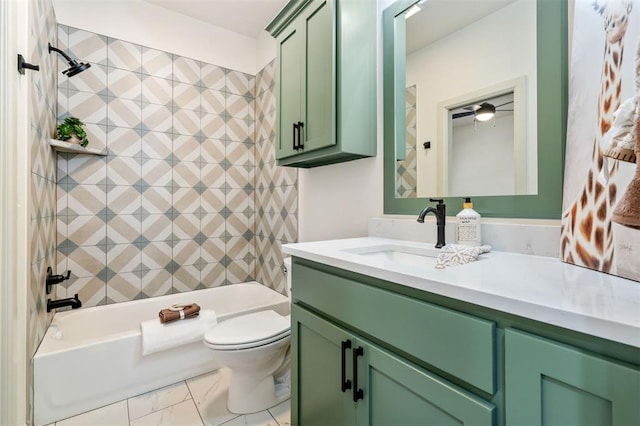 bathroom with toilet, marble finish floor, shower / tub combination, and vanity