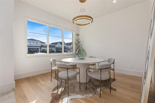 dining space featuring light hardwood / wood-style flooring