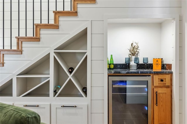 interior space with bar and wine cooler