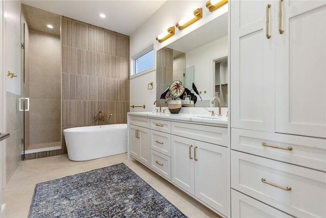 bathroom featuring separate shower and tub, tile patterned flooring, vanity, and tile walls